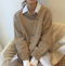 MELLY - Morbido cardigan in cashmere con abbottonatura diagonale per l'autunno