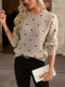 Maglione a pois di Zara: casual ed elegante per le donne in autunno e inverno