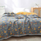 Coperta reversibile in cotone con motivi floreali